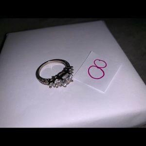 silver and diamond “engagement” ring